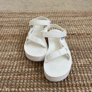 White Teva sandals